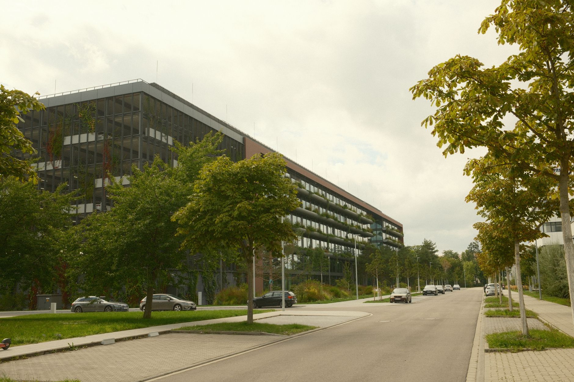 Modern low-rise office building surrounded by trees, typical of a Selangor suburban business park.
